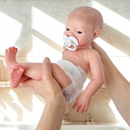 Muñeca Reborn Silicona "Adriana" (43 cm, 2.3kg) - Bebe, Hace Pis, Pelo Pintado y Caída de Cabeza